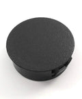 Black Nylon Hole Plugs For 1 1/8 Inch Holes With Locking Tabs Snaps Into Place Slightly Domed Textured Head