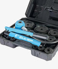 15 Ton Hydraulic Knockout Punch Set With 10 Slug Dies From 1/2 Inch To 4 Inch in durable plastic case with hydraulic pump and studs.