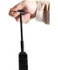 Hand holding T-handle of Ram-T Telescopic Ramrod For Muzzleloaders Adjustable Length From 22 To 28 Inches Easy Load And Clean