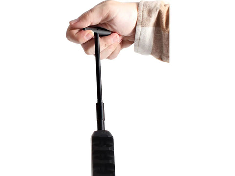 Hand holding T-handle of Ram-T Telescopic Ramrod For Muzzleloaders Adjustable Length From 22 To 28 Inches Easy Load And Clean