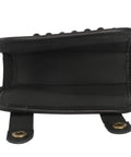 Interior view of genuine leather buttstock cheek rest with rifle shell holder, adjustable elastic straps with bottom closure visible