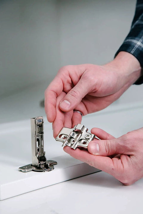 Person holding Premium Frameless Full Overlay Cabinet Hinges 10 Pack With Adjustable Closing Speed And Soft Close Self Closing Design