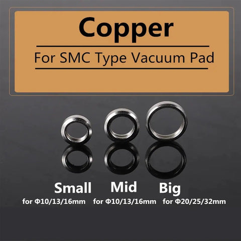 Small Industrial Manipulator Pneumatic Vacuum Pad Accessory Copper Buckle Ring for Heavy Duty Grip and Secure Attachment In Factory Settings, three copper rings varying in size.