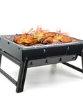 Grab And Go Portable Folding Charcoal Grill And Smoker For Travel And Outdoors with meat grilling on black stainless steel surface