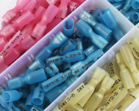 Color-coded red, blue, and yellow terminals from the All In One 220 Piece Wire Spade Connectors Kit With Heat Shrink Terminals.
