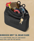 Sidekick Dry 3L Gear Case waterproof organizer for outdoor adventures with keys and items inside, charcoal rugged DryHide shell.