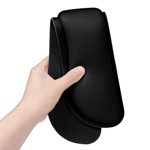 Hand holding a Cozy Memory Foam Keyboard Wrist Rest With Non Slip Base For Comfort And Pain Relief Ergonomic Mouse Pad Rest For Gaming Laptop And Computer Desk Use Cute Black.