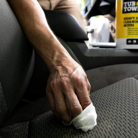 Person using Heavy Duty Fiber Weave Cleaning Wipes 8x7 Inches 40 Count Multipurpose Grime Buster on car seat upholstery