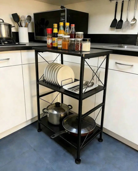 3-Tier Black Storage Shelf With Industrial X-Frame Design For Books, Decor, Baskets And Kitchen Essentials in a kitchen corner