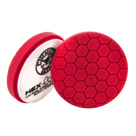 Two red pads from Hex-Logic Six Point Five Inch Buffing Pad Kit, Eight Piece Set With Pad Cleaner Included For Cars, Fits Large 6 Inch Dual Action Rotary And Large Throw Orbital Polishers, Durable Hook And Loop System For Polishing And Finishing