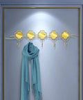 Top Shelf Wall Mounted Coat Rack With Five Heavy Duty Wrought Iron Hooks That Handle Every Jacket Key Backpack And Towel Without A Hitch While Adding A Smooth Modern Vibe To Your Entryway Organization Game, featuring a light blue scarf.