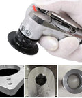 Mini pneumatic chamfering tool with replaceable blades for metal edge beveling; tool in hand with accessories