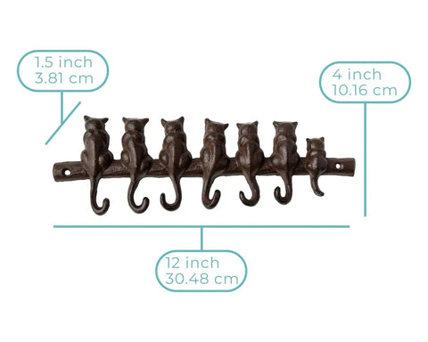 Hella Tough Cast Iron Wall Hook Rack With Seven Cute Cat Designs For Coats Keys And Hats, measuring 12x4 inches.