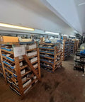 Warehouse with shelving containing Lightspeed Underwater Light Coating For Marine Illumination That Delivers Corrosion Protection Anti Fouling And Multicolored Finish With Easy Application For Dive Lights And Submersible Gear