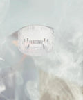 Professional Grade Smoke Sensor Removal Cup Featuring A Durable PP Textured Grip suspended amid smoke for quick alarm servicing.