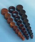 Three Pairs Organic Wood Ear Plugs Set with Double Flared Ear Tunnels Saddle Fit Wooden Gauges Five Eighths Inch 16mm Natural Black Brown Tones