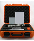 Pro-Grade Wireless Rebound Hammer And Wall Scanner With Voice Prompt And High-Res Digital Display For Bullseye Concrete Compression Checking And Nailing Down Stud Locations Instantly in an orange case with accessories.