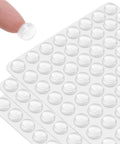 Close-up of 128 Pack Clear Rubber Cabinet Bumpers With Self Adhesive Silicone Pads For Cabinets Drawers And Doors Quiet Soft Close Anti Slam