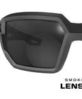 Close-up of Vision Type X Safety Glasses with anti fog and scratch resistant smoke lens, lightweight black frame visible