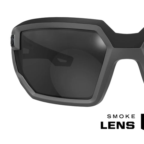 Close-up of Vision Type X Safety Glasses with anti fog and scratch resistant smoke lens, lightweight black frame visible