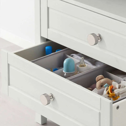 Open drawer with 20 Pack Brushed Satin Nickel Cabinet Knobs And Pulls, 1 Inch Single-Hole Drawer Handles, visible items inside.