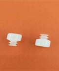 Built Like A Tank Double Industrial Vacuum Suction Cup With Automatic Chuck For Robotic Manipulators And No Sweat Production Line Work Gets Done Right In Dp Four Five Pack, two small white suction cups on an orange background.