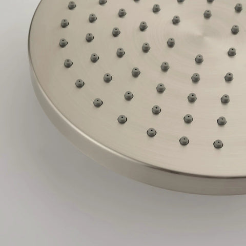 Close-up of Riviera Shower System With 8-Inch Rain Showerhead, Brushed Nickel Finish, showing spray nozzles and surface detail.