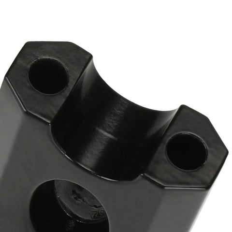 Close-up of Mini Bike Handlebar Risers Beefy 7 By 8 Inch 22mm Replacement with black aluminum body and mounting holes