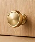 Champagne Bronze Cabinet Knobs Set Of 10 For Kitchen And Furniture, One And A Quarter Inch Single Hole Zinc Alloy Knobs, installed on wood