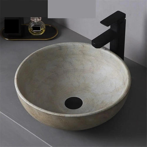 USZWBY Round Bathroom Vessel Sink - Modern Countertop Washbasin for Indoor & Outdoor Use Stylish Household Vanity Basin for Balcony & Bathroom - Durable & Easy to Clean viewed from the side with faucet.