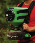 Lithium Ion Chest Spreader With Harness System, Adjustable Feed Rate, 24 Volt Power, 35 Pound Hopper in use for seeding