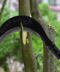 Manganese Steel Long Handle Hand Scythe For Weeding And Lawn Care With Thick Blade Heavy Duty Garden Tool For Outdoor Use in action