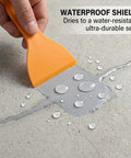 Heavy Duty Waterproof Concrete Crack Filler And Sealant For Driveways And Foundations No Sweat Weatherproof Patching Kit applied to crack.