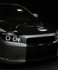 2005 To 2010 Scion tC LED Halo Projector Headlights Upgrade Kit With Black Housing And Angel Eye Rings fitted on a car