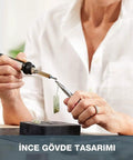 A person using the Top Tier Cordless Pen Engraver And Digital Soldering Iron Kit With Sweet 20V Battery for jewelry making.