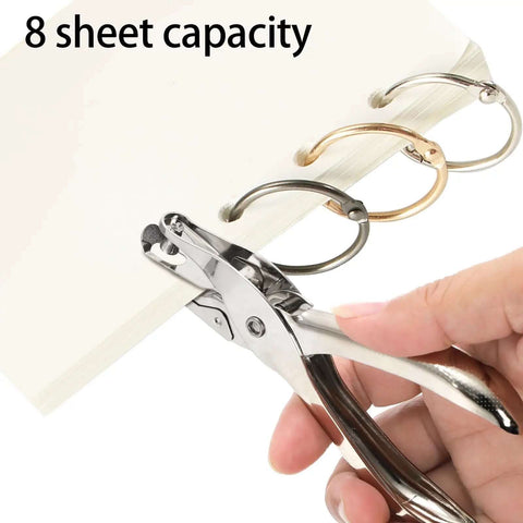 Using a metal handheld one hole punch from 24 Pack Handheld One Hole Punches, No Fuss One Quarter Inch Six Millimeter Metal Paper Puncher For Tags, Tickets, Labels, And Crafts, Eight Sheet Capacity, Portable Office Home School Tool For Quick Piercing on a stack of papers
