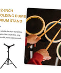Portable Folding Snare Drum Stand With Heavy Duty Alloy Frame Multi Angle Adjustable Metal Mount Detachable Practice Rack For Drummers Black design in use with drumsticks.
