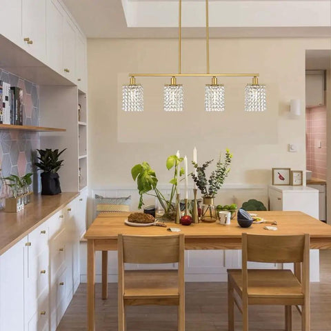 Crystal Linear Chandelier 4 Light Brushed Brass Farmhouse Pendant For Dining Room And Kitchen Island Gold Mid Century Modern Rectangle Hanging Light With Raindrop Crystals And Flush Mount Totally Lit above wooden dining table.