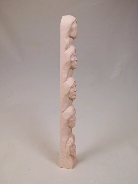 Learn To Carve A Native American Chief Face With A 12 Inch Hand Cast Resin Study Stick Kit side view of carved practice faces