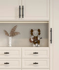 5 Pack Black Cabinet Knobs And Drawer Pulls installed on white cabinetry with modern hardware in kitchen or bathroom setting.