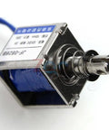 12V 2A Open Frame Solenoid Reset Electromagnet With 10mm Push Pull Stroke For Vending And Textile Machines DC Magnetic Actuator Open Coil Design Built In Mounting Board Heavy Duty DIY Friendly Plug And Play Ready, close-up side view