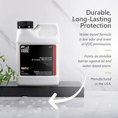 Premium Stone Sealer Water Based Formula for Natural Stone and Tile Surfaces Seals Against Stains and Spills with Invisible Barrier Go To Easy Application Pint Size 16 Oz bottle on wet countertop with water droplets