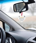 Ceramic engineer ornament hanging in car, Dope Mechanical Engineer Ornament Gift For Engineers And Architects, motivational quote visible.