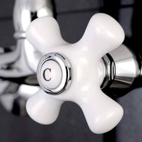 Close-up of handle on Old School Vintage Wall Mount Kitchen Faucet With Adjustable Center Spacing, polished chrome finish.