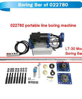 Front view of LT-30 line boring bar kit; steel bar with blue mounts and assorted accessories.