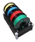 Hit The Ground Running With This Butter Smooth 3D Printer Motion Upgrade Kit Featuring Full AFC Compatible Chassis And Sharp Moons Drive Motors Clad In Bright Multi Color Custom Panels with various filament spools on a holder.