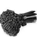 Heavy Duty Self Locking Zip Ties Provide A Rock Solid Nylon Cable Wrap Setup For Electricians With Assorted Sizes In A 100 Piece Fire Resistant Pack piled together for cord management.
