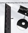 Close-up of Rock Solid 18 Inch Black Piano Hinges 4 Pack 304 Stainless Steel showing countersunk mounting holes.