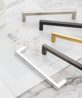 Assorted brushed nickel square bar cabinet handles on marble surface, 20 Pack Brushed Nickel Square Bar Cabinet Handles Set With Easy Install Six Point Three Inch 160mm Screw Hole Distance Solid Metal Hardware For Kitchen Cabinets Cupboards Bedroom Dressers Drawers Wardrobes Plus Free 25mm And 38mm Screws.