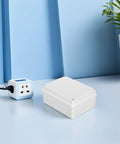 Super Cool 13 Piece Waterproof Junction Box Kit Ip65 Rated Plastic Electrical Enclosure on a blue table for outdoor use.